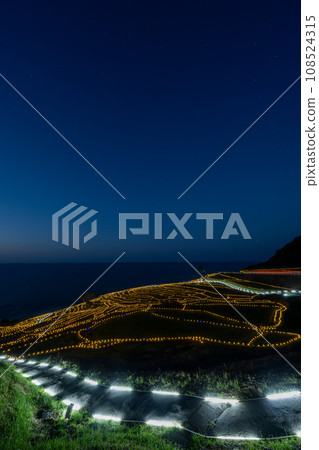 Tourist attractions in Oku-Noto | Illumination night view of the World Agricultural Heritage Site Shirome Senmaida | Sparkling ridges | Wajima City, Ishikawa Prefecture Tourist attractions in Oku-Noto | Illumination night view of the World Agricultural Heritage Site Shirome Senmaida | Sparkling ridges | Wajima City, Ishikawa Prefecture 108524315