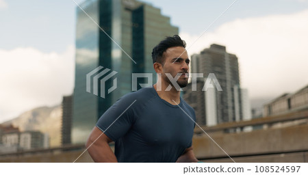 Workout, running and a sports man in the city for cardio training to improve fitness for a marathon. Wellness, exercise or health with a young runner or athlete in an urban town for a speed challenge Workout, running and a sports man in the city for cardio training to improve fitness for a marathon. Wellness, exercise or health with a young runner or athlete in an urban town for a speed challenge 108524597