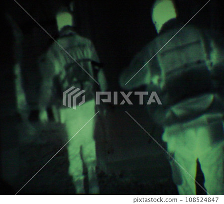 Military, people and green night vision, overlay or dark silhouette of spy, agent or terrorist risk to soldier. Police, surveillance or men training in infrared scope for army or security mission Military, people and green night vision, overlay or dark silhouette of spy, agent or terrorist risk to soldier. Police, surveillance or men training in infrared scope for army or security mission 108524847