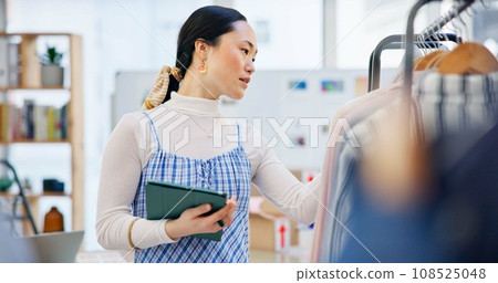 Fashion, worker and Asian woman with a tablet, retail and inventory with ecommerce, connection and small business. Person, shop assistant or worker with technology, checking stock and online shopping Fashion, worker and Asian woman with a tablet, retail and inventory with ecommerce, connection and small business. Person, shop assistant or worker with technology, checking stock and online shopping 108525048
