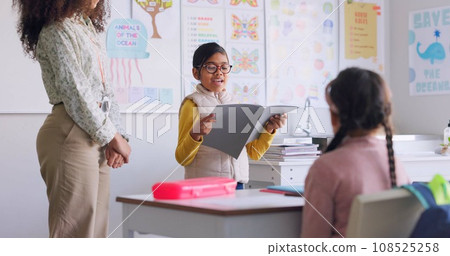 School book, child and reading in class for learning, development and communication. A smart girl kid or student and woman teacher for language story, support and confidence in elementary classroom 108525258
