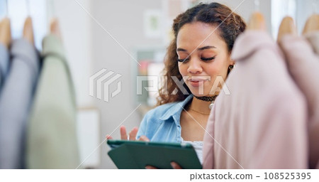 Retail, ecommerce and woman with a tablet, store and inventory with connection, fashion or typing. Person, shop assistant or worker with technology, small business or boutique with retail or internet 108525395