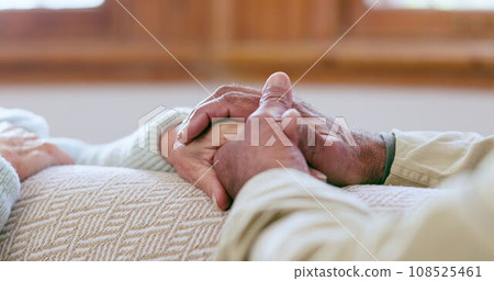 Senior couple, holding hands and love closeup with empathy, kindness and care in a home. Retirement, marriage hope and elderly people together with trust and support for healing and helping in house 108525461
