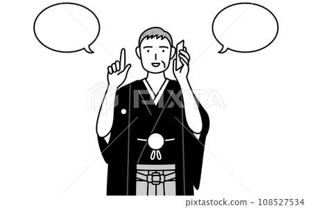 A senior man in a crested hakama pointing while talking on the phone, at a New Year's shrine visit or a wedding. A senior man in a crested hakama pointing while talking on the phone, at a New Year's shrine visit or a wedding. 108527534