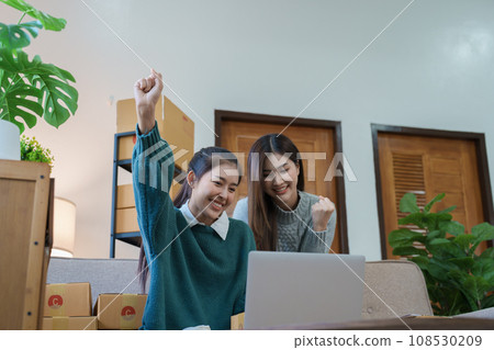 Starting small business entrepreneur of independent Asian woman smiling using computer laptop with cheerful success of online marketing Starting small business entrepreneur of independent Asian woman smiling using computer laptop with cheerful success of online marketing 108530209