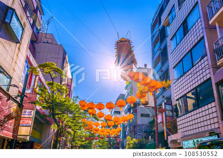 Yokohama cityscape in Japan 2024 Yokohama Chinatown with Chinese New Year lights. Dragon lanterns also appear on Ximen Street in Chinatown = November 3rd 108530552