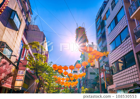 Yokohama cityscape in Japan 2024 Yokohama Chinatown with Chinese New Year lights. Dragon lanterns also appear on Ximen Street in Chinatown = November 3rd 108530553