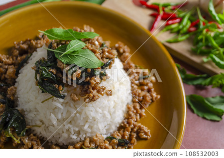 Minced pork with basil over rice is a Thai food that is popular among Thai people Minced pork with basil over rice is a Thai food that is popular among Thai people 108532003