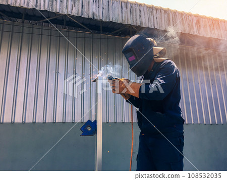 Welding Metal, Man welding steel blurred background, Welder concept, Welding Electrodes, Welding Metal, Man welding steel blurred background, Welder concept, Welding Electrodes, 108532035