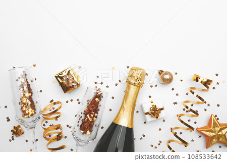 Christmas background with golden decoration on white background, space for text 108533642