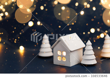Christmas decorations with garland on dark background Christmas decorations with garland on dark background 108533646