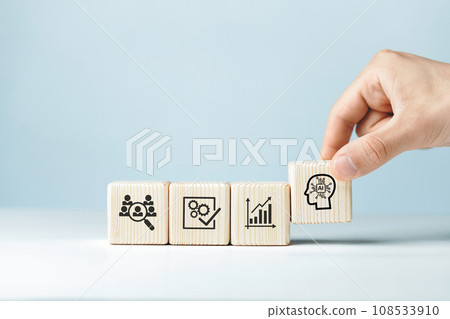 Assembled wooden cubes on the topic of the application of artificial intelligence in business Assembled wooden cubes on the topic of the application of artificial intelligence in business 108533910