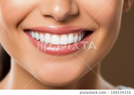 Close up of beautiful wide smile with healthy white teeth Close up of beautiful wide smile with healthy white teeth 108534158