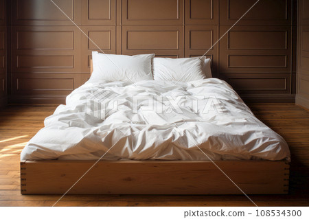 The wood bed with white bedding 108534300