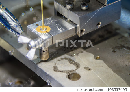 The small hole making process by super drill EDM process. 108537495