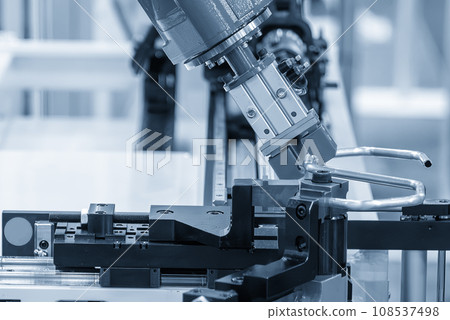 The steel pipe bending process by robotic arm. The steel pipe bending process by robotic arm. 108537498