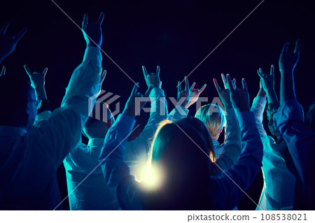 Back view of people, employees, co-workers attending business conference, meeting, workshop. Applauding to couch. Growth Back view of people, employees, co-workers attending business conference, meeting, workshop. Applauding to couch. Growth 108538021