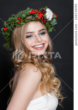 Happy woman with cute smile. Good-looking female model with long wavy blonde hair Happy woman with cute smile. Good-looking female model with long wavy blonde hair 108538495