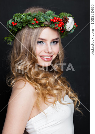 Beautiful woman smiling. Good-looking female model with long wavy blonde hair Beautiful woman smiling. Good-looking female model with long wavy blonde hair 108538496