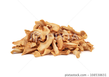 Pile of dried apples or apple chips on a white background. Pile of dried apples or apple chips on a white background. 108538631