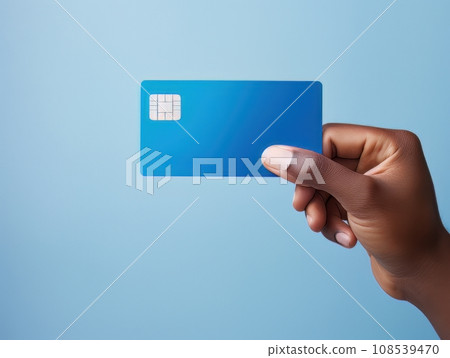 Male hand holding a blue bank card on a blue background AI Male hand holding a blue bank card on a blue background AI 108539470