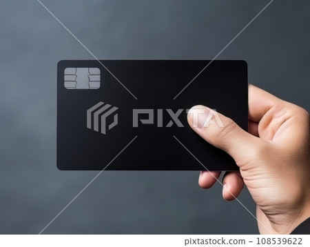 Male hand holding a black bank card on a blue background AI Male hand holding a black bank card on a blue background AI 108539622