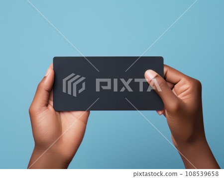Male hand holding a black bank card on a blue background AI Male hand holding a black bank card on a blue background AI 108539658