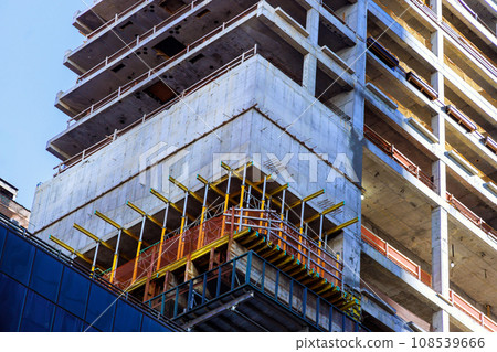 There is construction site where new skyscraper buildings are being built for large American cities. There is construction site where new skyscraper buildings are being built for large American cities. 108539666