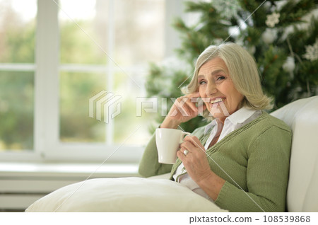 Portrait of a senior woman with cup of tea 108539868