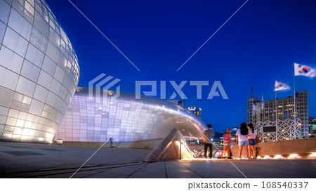 Modern architecture of Dongdaemun Design Plaza or DDP at night, the famous Moderness landmark of Seoul, South Korea. Modern architecture of Dongdaemun Design Plaza or DDP at night, the famous Moderness landmark of Seoul, South Korea. 108540337