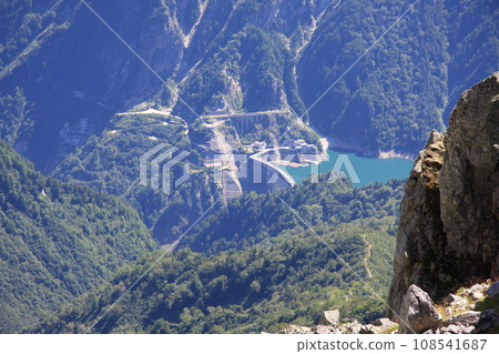 Kurobe Dam seen from near the summit of Mt. Tateyama Kurobe Dam seen from near the summit of Mt. Tateyama 108541687