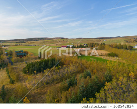 Aerial top view of houses or hotel with mountains in Iceland islands in the summer season, Europe hills, nature landscape background. 108542924