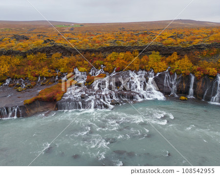 Aerial top view of Hraunfossar waterfall in autumn fall season in Iceland. Famous nature landscape background 108542955