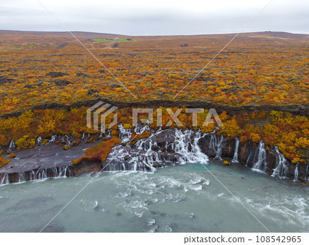 Aerial top view of Hraunfossar waterfall in autumn fall season in Iceland. Famous nature landscape background 108542965