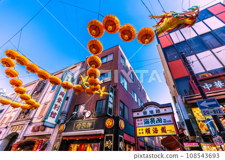 Yokohama cityscape in Japan 2024 Yokohama Chinatown with Chinese New Year lights. Dragon lanterns appear on Chinatown Boulevard = November 3rd 108543693