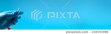 Pipette drip red liquid drops into laboratory test glass tubes, nobody. Long banner. 108543996