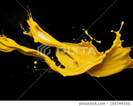 yellow paint splash on black background yellow paint splash on black background 108544588