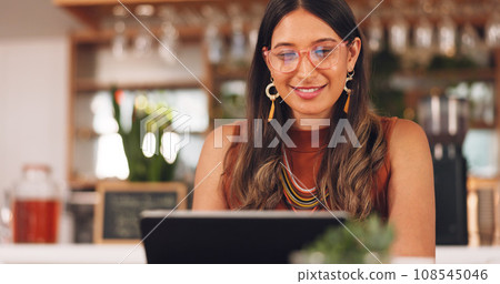Laptop, freelance and woman in coffee shop with glasses, online research career and smile. Communication, technology and remote work, happy girl in cafe at computer, virtual assistant and reflection. 108545046