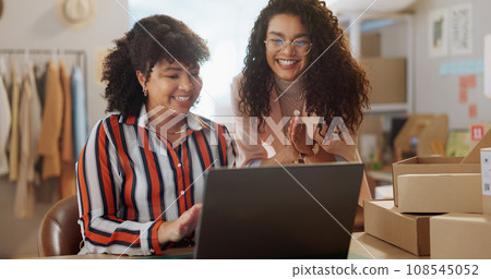 Teamwork, happy and women with laptop for fashion designer, supply chain and ecommerce startup. Small business, online shopping and people celebrate sale on computer for website, order and shipping Teamwork, happy and women with laptop for fashion designer, supply chain and ecommerce startup. Small business, online shopping and people celebrate sale on computer for website, order and shipping 108545052