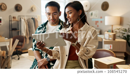 Business people, tablet and fashion designer in teamwork for planning, strategy or ideas in logistics at boutique. Man and woman in team discussion with technology for clothing design or supply chain 108545270