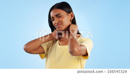 Neck pain, healthcare and woman in studio with spine issue, emergency and bad posture on blue background. Muscle pressure, fibromyalgia and sick with burnout and injury, mockup space and inflammation Neck pain, healthcare and woman in studio with spine issue, emergency and bad posture on blue background. Muscle pressure, fibromyalgia and sick with burnout and injury, mockup space and inflammation 108545329