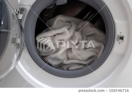 Used towel in washing machine Used towel in washing machine 108546716