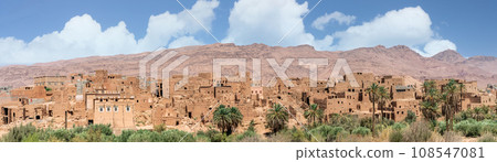 Tinghir, sometimes known as Tinerhir, is a city in Morocco, nestled in the High Atlas Mountains. It's known for its scenic beauty, with lush green oases and the Todgha Gorge Tinghir, sometimes known as Tinerhir, is a city in Morocco, nestled in the High Atlas Mountains. It's known for its scenic beauty, with lush green oases and the Todgha Gorge 108547081