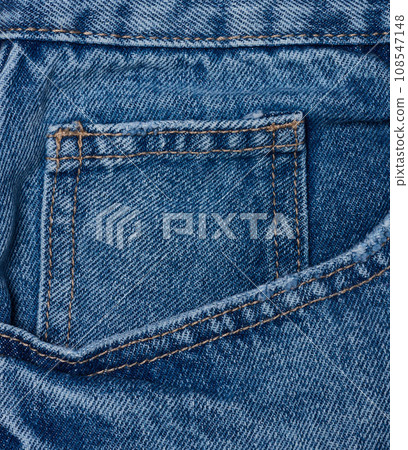 Blue jeans front pocket with buttons, close up 108547148