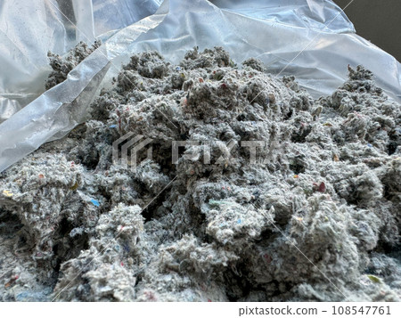 Cellulose insulation for walls and floors. Recycled newsprint. Heat preservation and energy saving 108547761