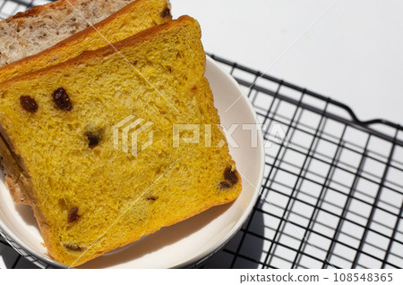 Whole grain bread slices on white background. Whole grain bread slices on white background. 108548365