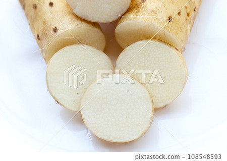 Fresh nagaimo on white background. Fresh nagaimo on white background. 108548593