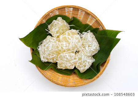Steamed tapioca cake or cassava cake with grated coconut Steamed tapioca cake or cassava cake with grated coconut 108548603
