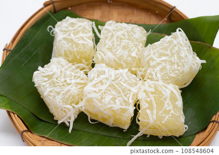 Steamed tapioca cake or cassava cake with grated coconut 108548604
