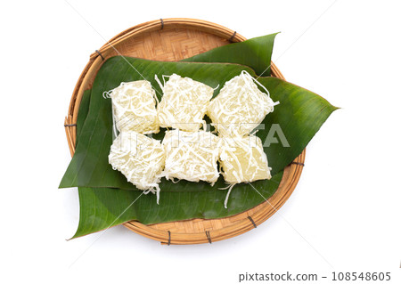 Steamed tapioca cake or cassava cake with grated coconut Steamed tapioca cake or cassava cake with grated coconut 108548605
